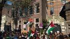 Hundreds of pro-Palestine supporters gathered outside the University of Amsterdam this week. 
