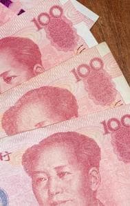 Yuan hits low
