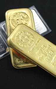 Gold and Silver prices slide